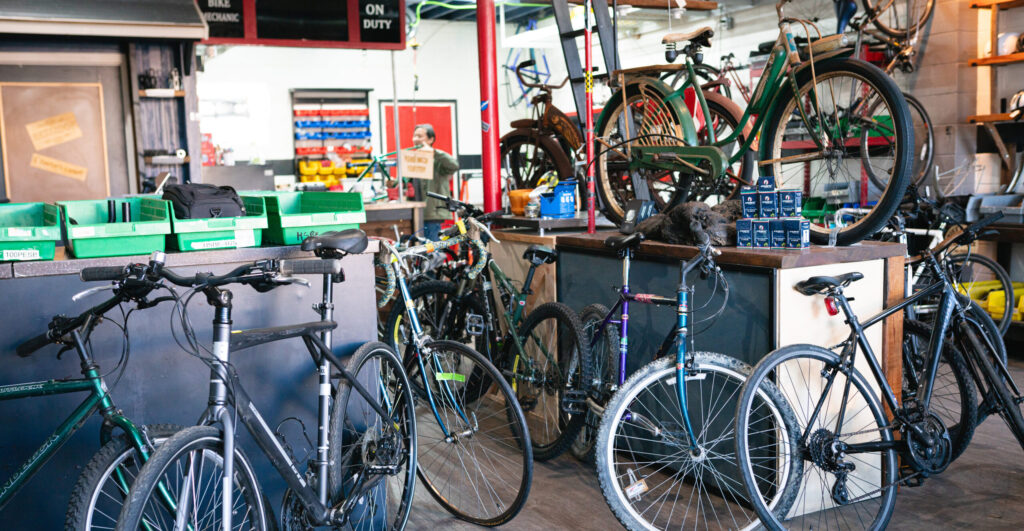 A shop filled with bikes and equipment.